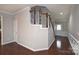 Bright entryway with hardwood floors and neutral walls at 16806 Dunaverty Pl, Charlotte, NC 28277