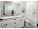 Elegant bathroom with double vanity, granite countertop, and a separate shower/tub at 1814 Berryhill Rd, Charlotte, NC 28208