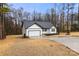 Newly built home with a white exterior and grey roof at 2177 Mintew Cir, Lincolnton, NC 28092