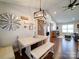 Bright dining area features a farmhouse table with built-in bench seating at 356 Cooper Farm Rd, Statesville, NC 28625