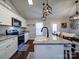 Bright kitchen boasts granite countertops and stainless steel appliances at 356 Cooper Farm Rd, Statesville, NC 28625