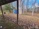 View of backyard with shed and wooded area at 4766 Dolph Monroe Rd, Maiden, NC 28650