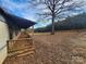 Wooden deck and side view of the house in wooded setting at 4766 Dolph Monroe Rd, Maiden, NC 28650