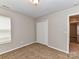 Bedroom with double door closet and carpet at 7120 Winding Cedar Trl, Harrisburg, NC 28075