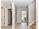 View of entryway with tile floor and access to other rooms at 7120 Winding Cedar Trl, Harrisburg, NC 28075