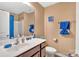 Clean bathroom with shower, toilet and vanity at 7412 Sienna Heights Pl, Charlotte, NC 28213