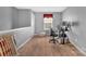 Home office with carpeted floor and standing desk at 7412 Sienna Heights Pl, Charlotte, NC 28213