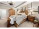 Main bedroom with wood furniture and a large window at 10118 Passau Path Dr, Huntersville, NC 28078