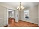 Formal dining area with hardwood floors and chandelier at 2427 Sandlewood Dr, Gastonia, NC 28054