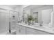 Elegant bathroom featuring double vanity, shower, and modern decor at 5145 Fireweed Ct, Dallas, NC 28034