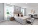 Main bedroom with plush bed, neutral decor, and large windows at 5145 Fireweed Ct, Dallas, NC 28034