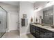 Double vanity bathroom with granite countertop and shower at 1385 Rainier Dr, Fort Mill, SC 29708