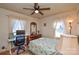 Charming bedroom with a double bed, desk, and ceiling fan at 2710 Julep Ln, Charlotte, NC 28273