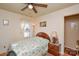 Serene bedroom featuring a double bed, ceiling fan, and window at 2710 Julep Ln, Charlotte, NC 28273