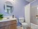 Simple bathroom with single vanity and tub shower combo at 5732 Cardington Ct, Charlotte, NC 28216