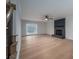 Living room with hardwood floors, fireplace, and lots of natural light at 640 Deerfield Dr, Mount Holly, NC 28120