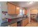 Kitchen features light wood cabinets, double sink, and microwave at 128 Tr Foster Rd, Kings Mountain, NC 28086