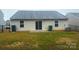 Private backyard with patio and fenced yard at 1401 Nia Rd, Charlotte, NC 28215