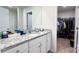 Bathroom boasts a granite vanity and walk-in closet at 1401 Nia Rd, Charlotte, NC 28215