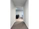 Long hallway offering views into the living room at 1401 Nia Rd, Charlotte, NC 28215