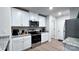 Modern kitchen with stainless steel appliances at 1401 Nia Rd, Charlotte, NC 28215