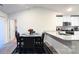 Kitchen with granite countertops and breakfast bar at 1401 Nia Rd, Charlotte, NC 28215