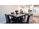 Eat-in kitchen with granite countertops and breakfast table at 1401 Nia Rd, Charlotte, NC 28215