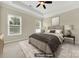 Virtually staged bedroom with ceiling fan and neutral color scheme at 1421 Wheeltree Rd, Clover, SC 29710