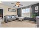 Spacious bonus room features a comfortable sectional sofa and large window at 168 D Limerick Rd, Mooresville, NC 28115