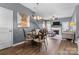 Elegant dining room with a glass-top table and four ornate chairs at 168 D Limerick Rd, Mooresville, NC 28115