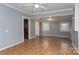 Simple dining area with wood-look floor and grey walls at 1781 33Rd Street Sw Dr, Hickory, NC 28602