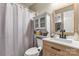 Clean bathroom with updated vanity and fixtures at 1919 Crooked Creek Dr, Charlotte, NC 28214