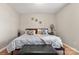 King-size bed, stylish decor, and large window in bedroom at 1919 Crooked Creek Dr, Charlotte, NC 28214