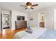 Bright bedroom with hardwood floors and en-suite bathroom at 1919 Crooked Creek Dr, Charlotte, NC 28214