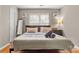 Spacious bedroom with a king-size bed and plenty of natural light at 1919 Crooked Creek Dr, Charlotte, NC 28214