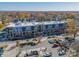 Aerial view of building and parking lot with surrounding neighborhood visible at 2401 Euclid Ave # 302, Charlotte, NC 28203