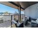 Spacious balcony with wicker furniture and city views at 2401 Euclid Ave # 302, Charlotte, NC 28203