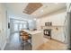 Modern kitchen with white cabinets, stainless steel appliances, and an island at 2401 Euclid Ave # 302, Charlotte, NC 28203