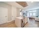 Modern kitchen with white cabinets, island, and stainless steel appliances at 2401 Euclid Ave # 302, Charlotte, NC 28203