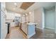 Modern kitchen with white cabinets, stainless steel appliances and an island at 2401 Euclid Ave # 302, Charlotte, NC 28203