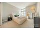 Spacious main bedroom with large bed and ample natural light at 2401 Euclid Ave # 302, Charlotte, NC 28203