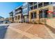 Exterior view showing building and parking lot with ample parking spaces at 2401 Euclid Ave # 302, Charlotte, NC 28203