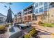 Community patio with seating area and fire pit, perfect for relaxing at 2401 Euclid Ave # 302, Charlotte, NC 28203