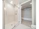 Walk-in shower with glass enclosure and modern tile at 2401 Euclid Ave # 302, Charlotte, NC 28203