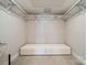 Large walk-in closet with built-in shelving and drawers at 2401 Euclid Ave # 302, Charlotte, NC 28203