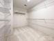 Spacious walk-in closet with wire shelving at 2500 Crescent Knoll Dr, Matthews, NC 28105