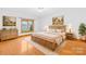 Spacious bedroom with hardwood floors and large windows at 2510 Burton Estates Ln, Lincolnton, NC 28092
