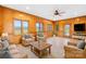Bright Gathering room with wood walls and tiled floors at 2510 Burton Estates Ln, Lincolnton, NC 28092