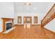 Spacious living room with hardwood floors and a fireplace at 2510 Burton Estates Ln, Lincolnton, NC 28092