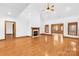 Living room featuring hardwood floors and a fireplace at 2510 Burton Estates Ln, Lincolnton, NC 28092